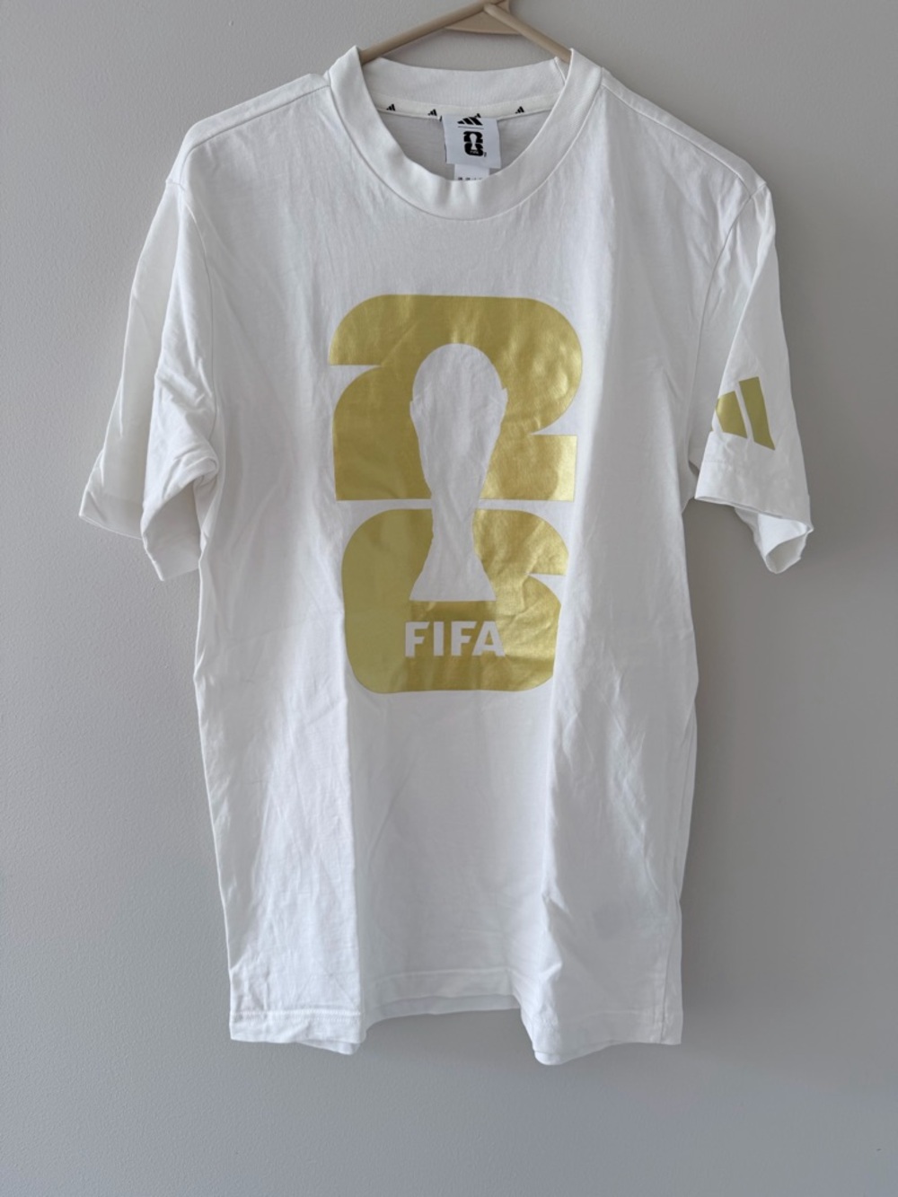 adidas White Short Sleeve Tee with Gold FIFA Trophy Graphic